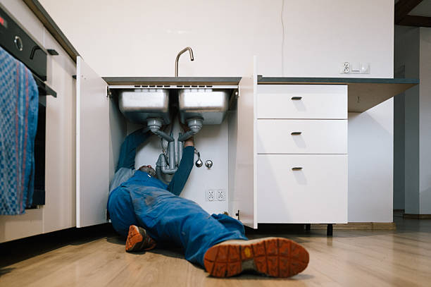 Professional Drain Cleaning technician working in Olivet, MI